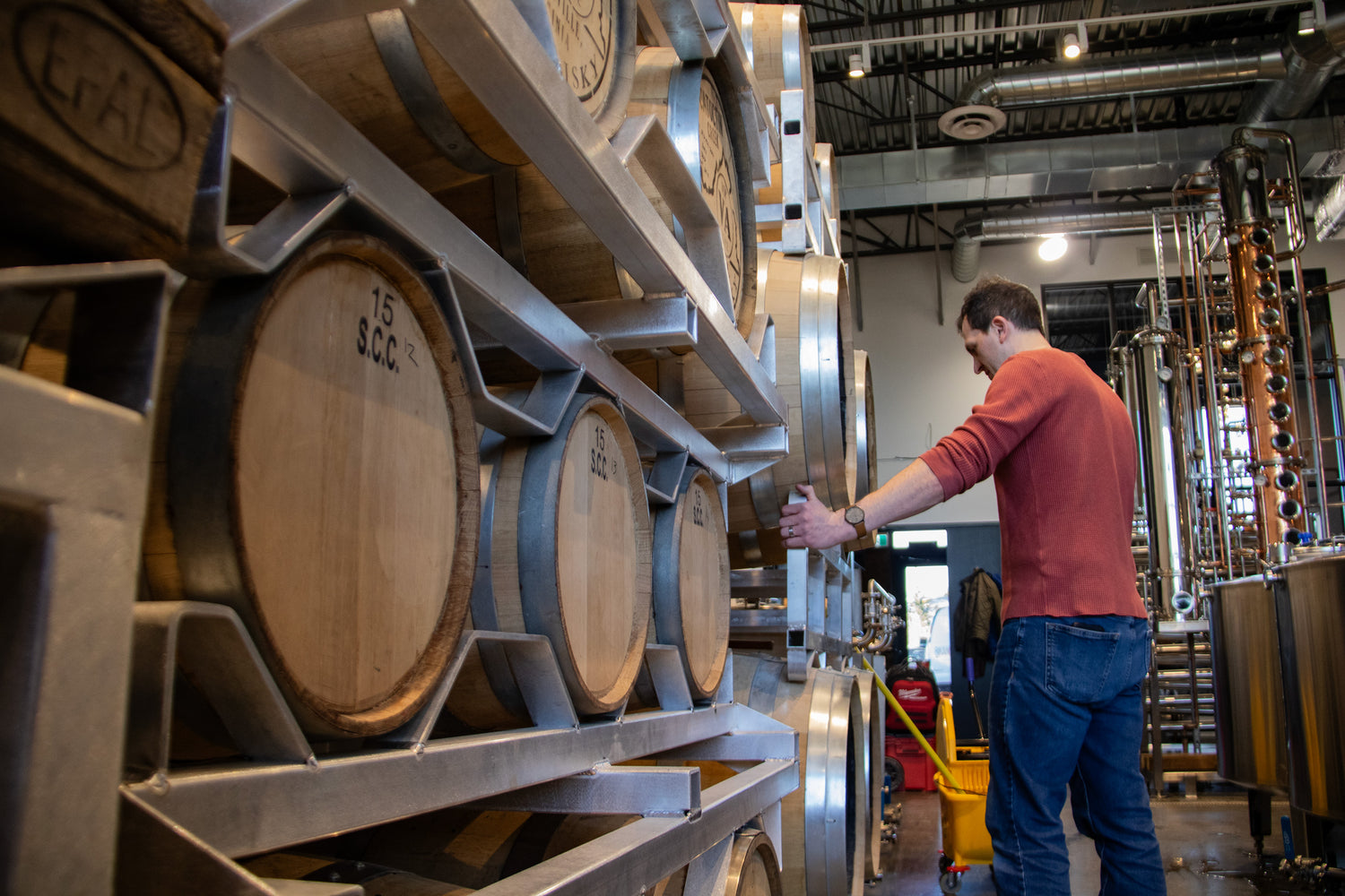 Master Distiller, Adam Brierley, tends to casks.