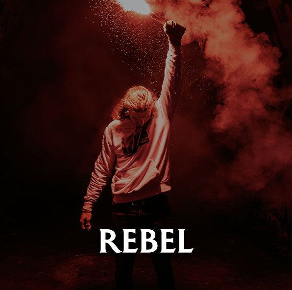 Person holding a smoke device with the word 'REBEL' in red and black tones.